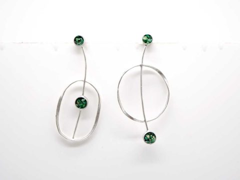 Handmade forged earring hanging different round and oval in silver