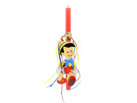 Handmade light blue Easter candle with Pinocchio puppet.