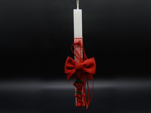 white flat candle with ribbon and bones for hair