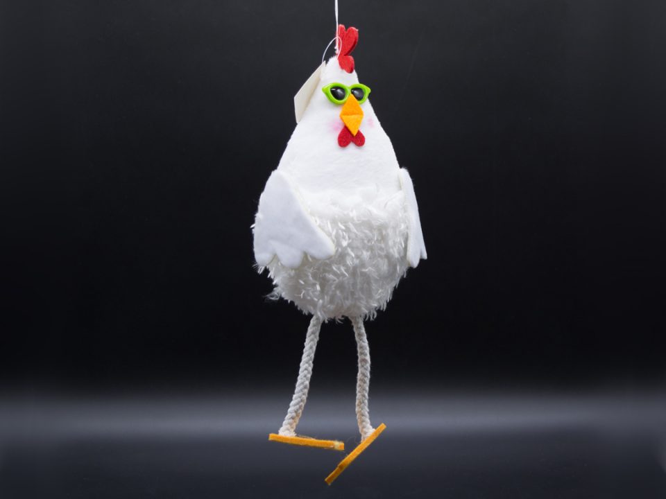 Handmade plush white rooster hanging with glasses.