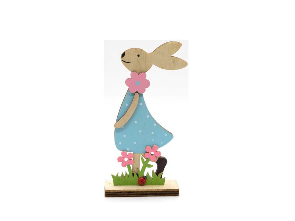 Handmade wooden decorative bunny with light blue dress.