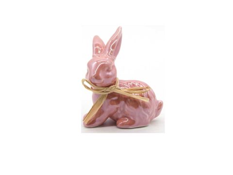 Product Ceramic decorative bunny seated, in glossy pink color