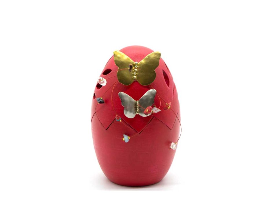 Handmade ceramic egg, Opening, red with a gold and a silver butterfly.