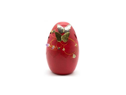 Handmade ceramic egg, red with a gold and a silver butterfly.