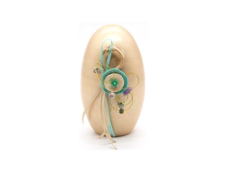 Handmade ceramic egg, gold with bright green decoration