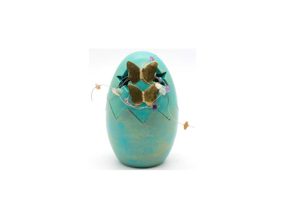 Handmade ceramic egg, perforated (stars) opening, bright green with golden butterflies.