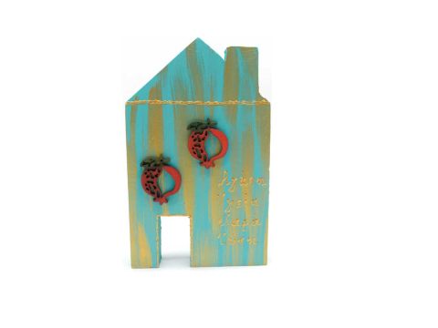 Handmade decorative wooden turquoise house with wishes