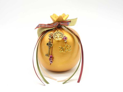 Handmade seated large gold ceramic pomegranate with metallic gold elements