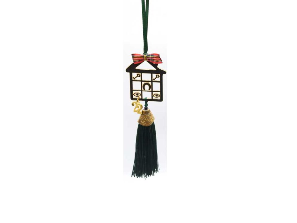 Handmade charm gold house perforated with green tassel