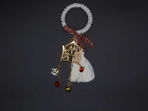 pendant charm, wreath with white cord and gold perforated house